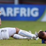 Suarez banned after taking bite out of Italy