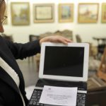 Pope’s iPad fetches $30,500 at auction