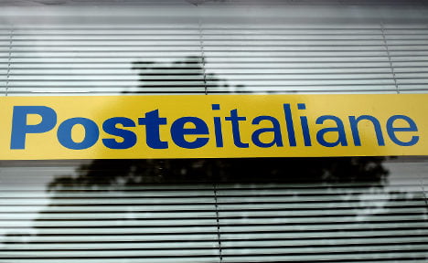 Italy's privatization drive begins with postal debut