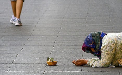 Italian town to fine people who give money to beggars