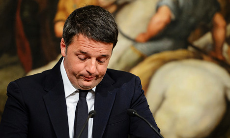 Renzi resigns, hinting at early elections