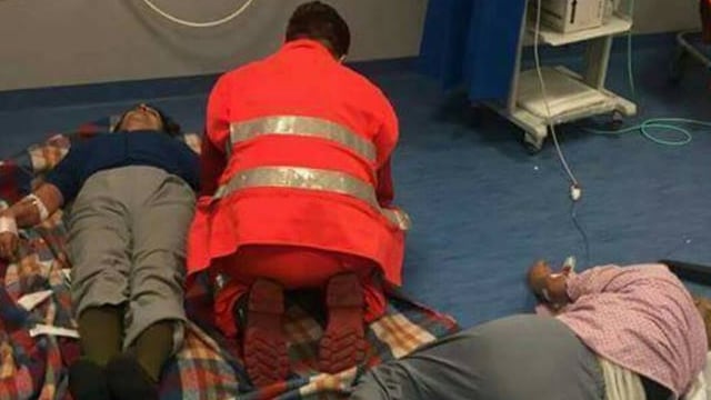 Italian hospital chief suspended after photos show patients treated on the floor