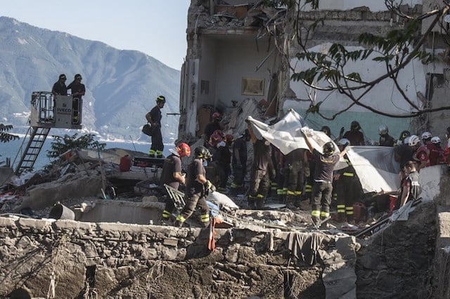Eight bodies pulled from collapsed apartment block near Naples