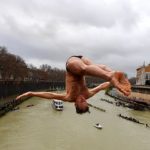 Romans brave chilly Tiber for New Year plunge