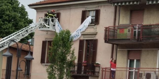 Anger in Italy after firefighters 'forced' to remove Salvini protest banner
