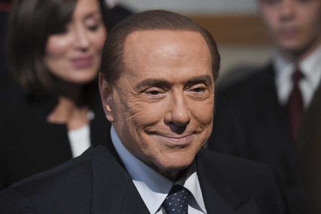 Italy’s Berlusconi leaves hospital after op and vows to fight election