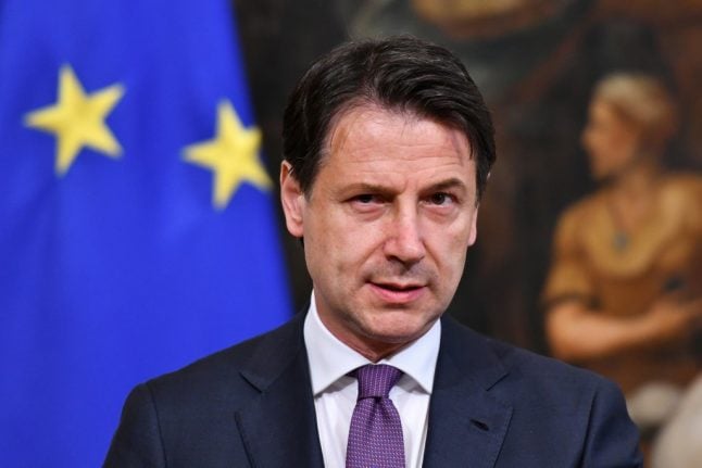 Italy 'absolutely determined' to avoid EU sanctions over debt: PM