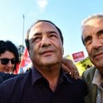Trial of Italy’s ‘migrant model’ mayor adjourned