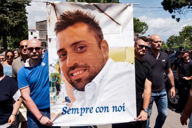 American murder suspect says Italian police beat him in custody