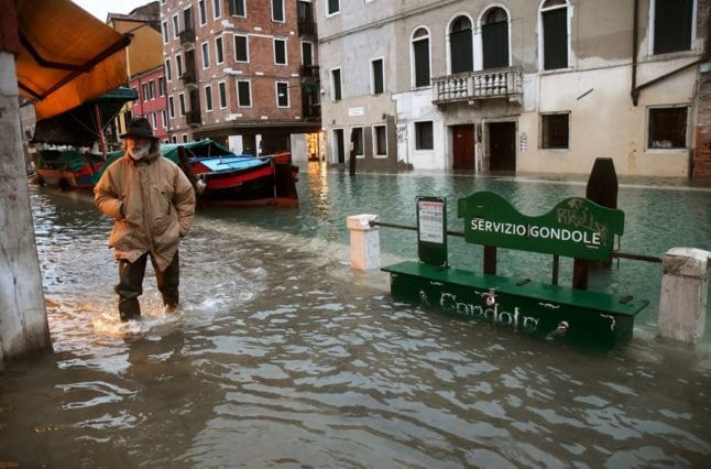 Venice tide barriers raised after flooding due to 'miscalculation'