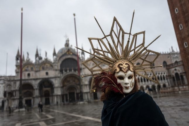 IN PHOTOS: Venice celebrates carnival without tourist crowds