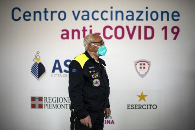 A civil protection department workers at a Covid vaccination centre.