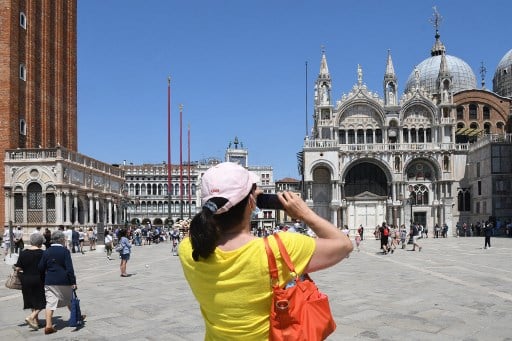 Dress up and pay up: Venice mayor announces updated plans to control tourism in the city