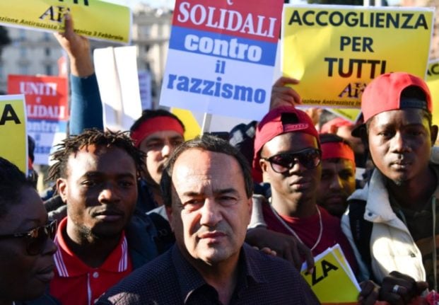 Italian mayor who helped migrants gets 13-year prison sentence