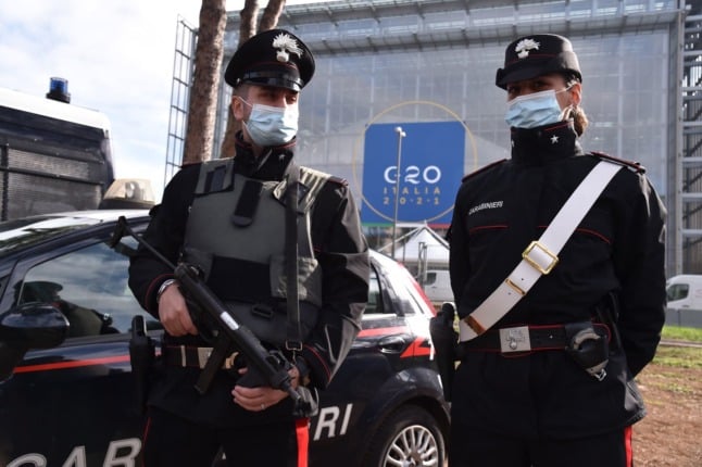 Police guard the “La Nuvola” convention center in the EUR district of Rome, where the upcoming G20 summit of heads of states will be held.
