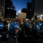 Italian police raid anti-vax activists over threats to prime minister