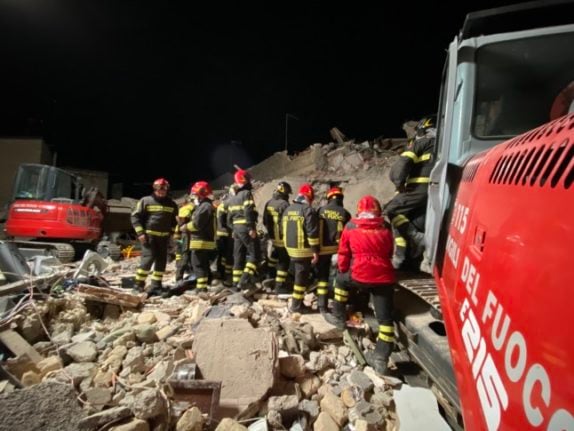 Firefighters at the site of the blast in Ravanusa, Sicily, on Tuesday.