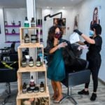Italy tightens Covid green pass requirements for hairdressers and shops